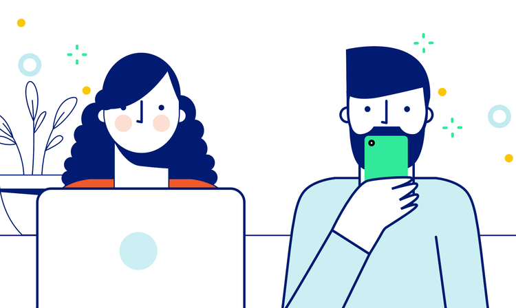 Adults using laptop and smartphone